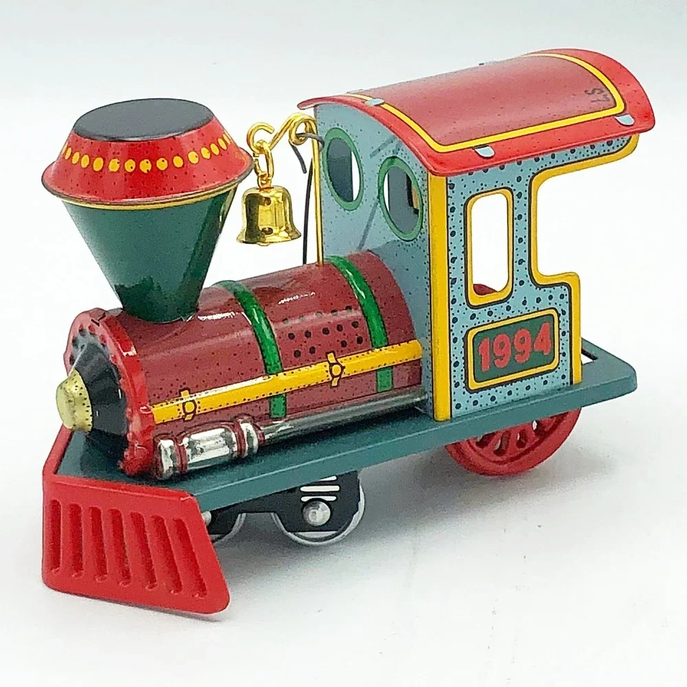 Yuletide Central #1 in ser Hallmark Ornament Tin Train 1994
